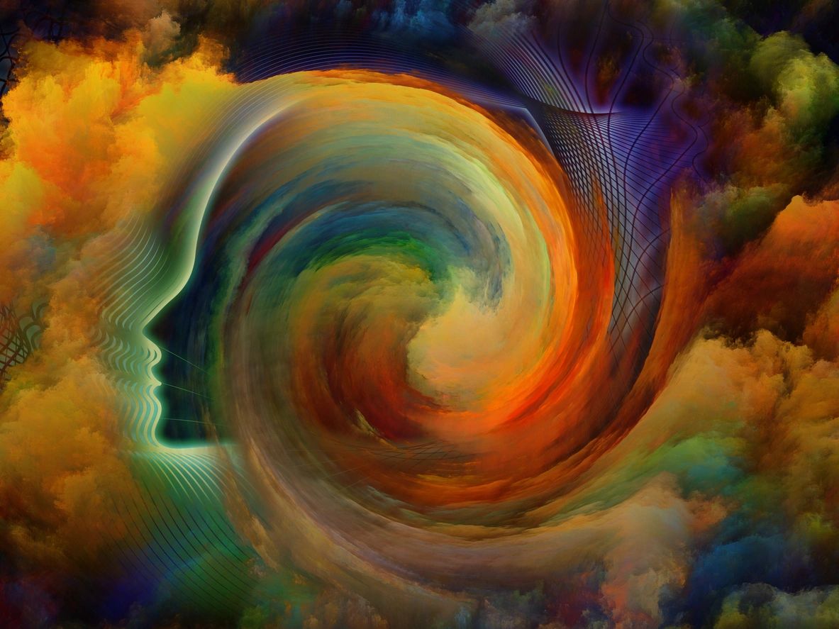A swirling vortex blending a human profile with vibrant, cosmic colors.
